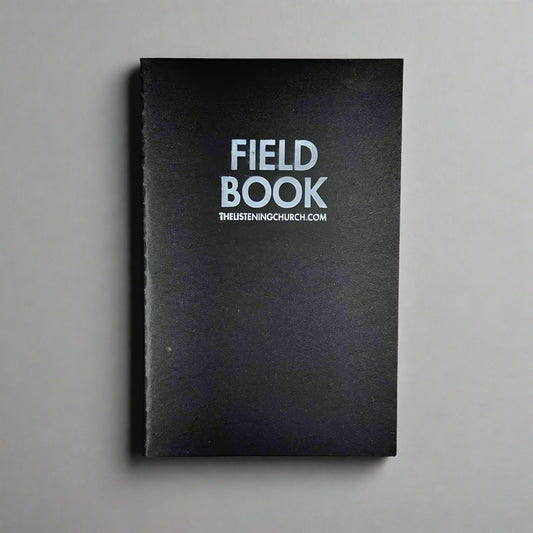 Black field book with 'FIELD BOOK' and 'THELISTENINGCHURCH.COM' text on a gray background